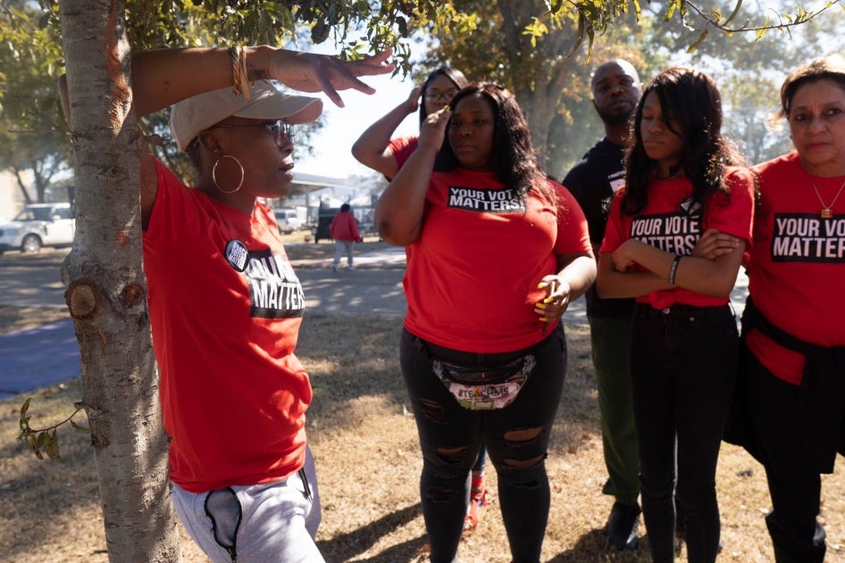 Amanda Furdge (left) advises participants of the Young Women’s Leadership Institute on how to engage and educate registered voters