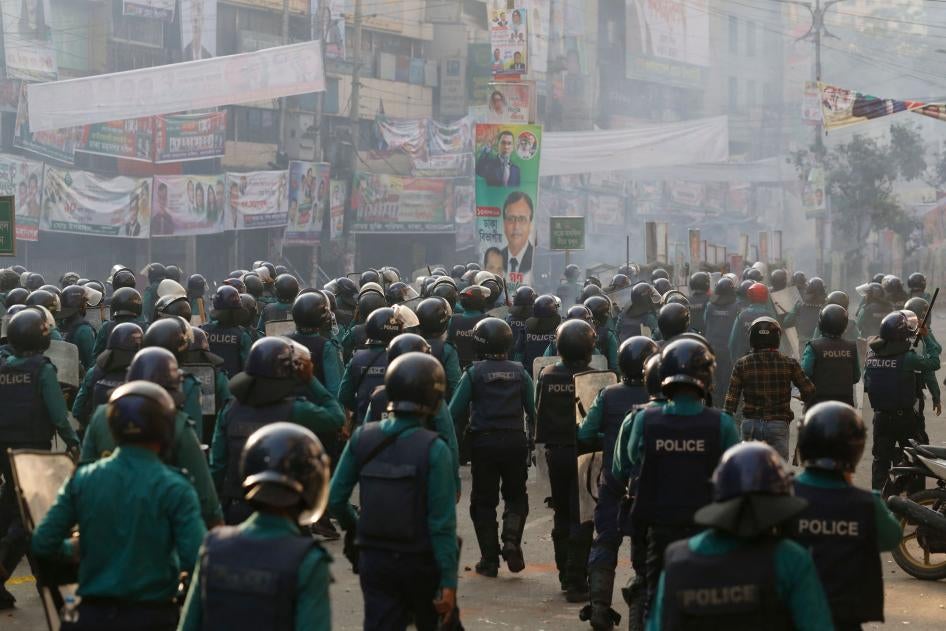 Police confront Bangladesh Nationalist Party (BNP) activists gathered in front of the party's central office in Dhaka.