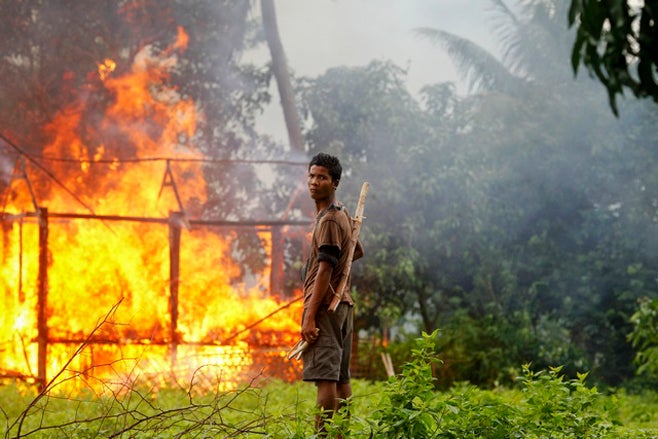 حقيقة ما يحدث في بورما 2012_burma_burninghouse
