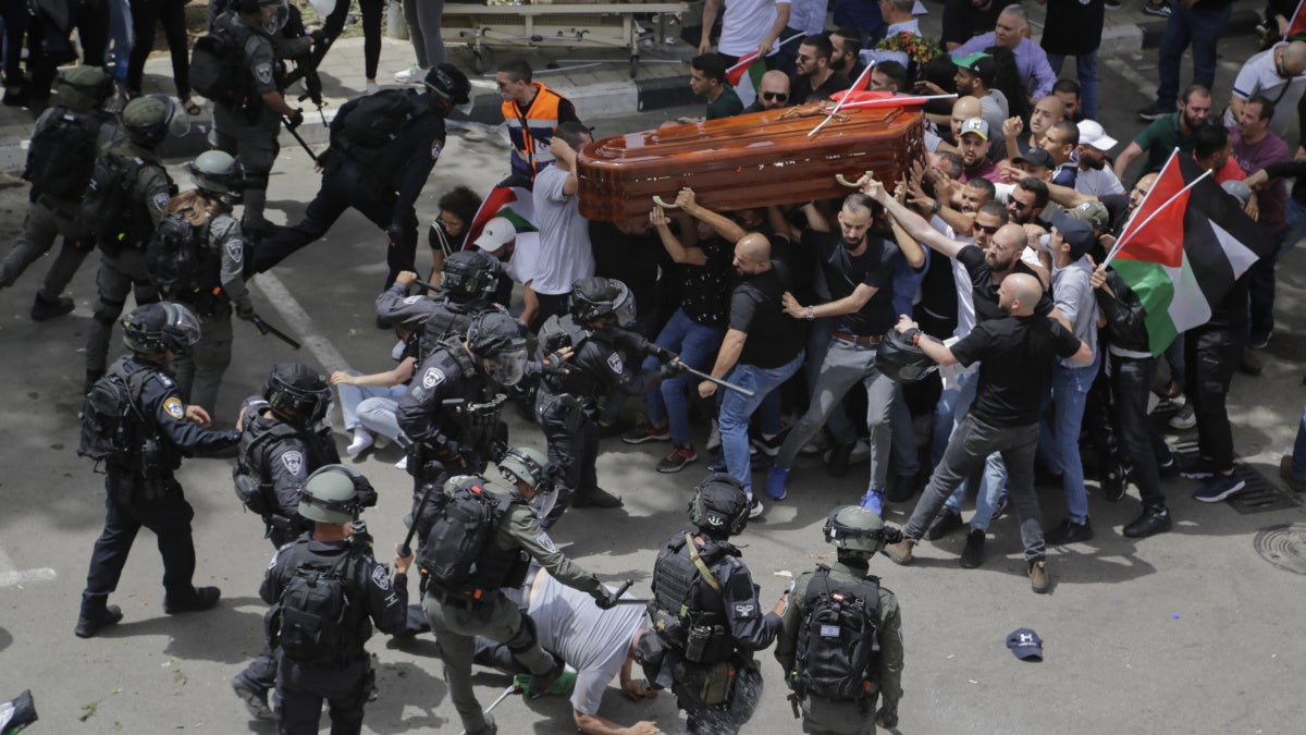 Israeli police assault Palestinians during journalist Shireen Abu Aqla’s funeral procession in occupied East Jerusalem on May 13, 2022.