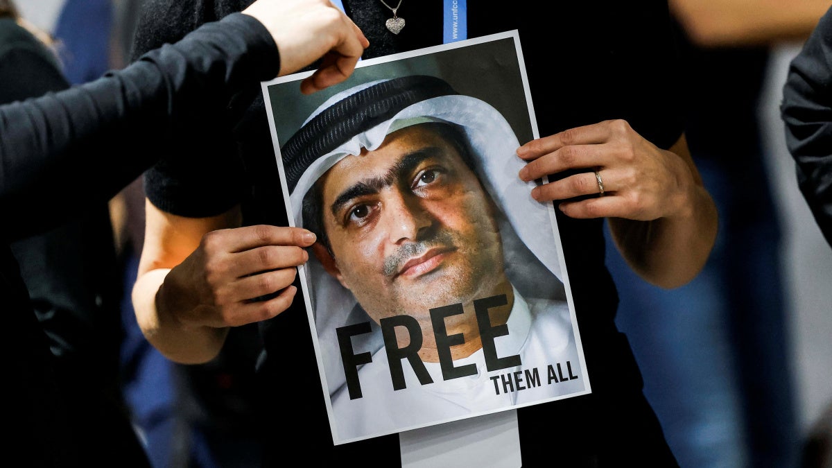 Activists hold a portrait of UAE human rights activist Ahmed Mansoor during a protest in support of political prisoners at the COP29 United Nations climate change conference, in Baku, Azerbaijan, November 20, 2024.