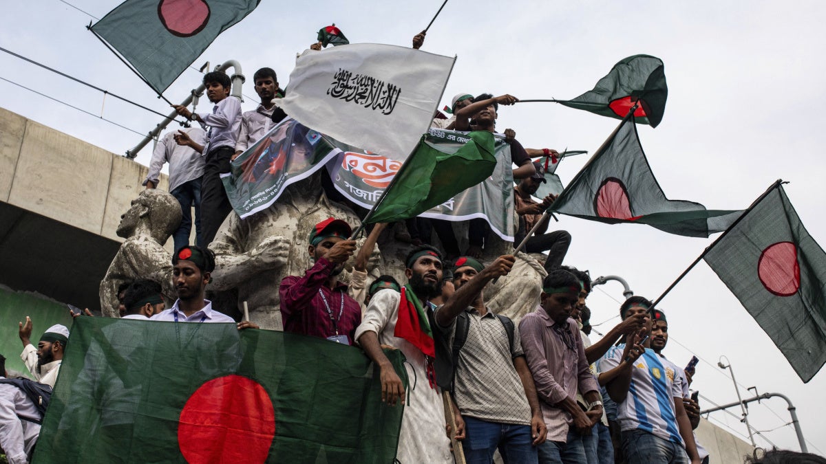 https://www.hrw.org/sites/default/files/styles/opengraph/public/media_2025/01/202501asia_bangladesh_protest_flags.jpg?h=833ce7e2&itok=roRw75CY&utm_source=chatgpt.com