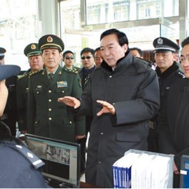 Chen Quanguo visits a "convenience police-post" in Lhasa, TAR, during Chinese New Year festivities in 2012.