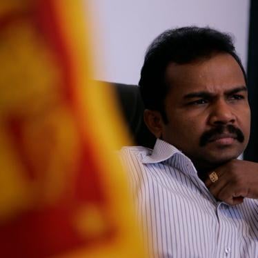 Former LTTE commander and armed group leader Vinayagamoorthi Muralitharan, known as Karuna Amman, speaks to the media  at his office in Colombo as minister for national integration in the Sri Lankan government, May 2009.