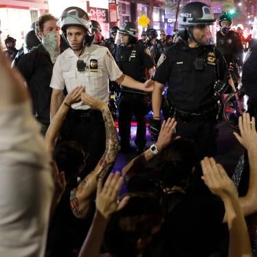 Police arrest protesters as they march through the streets of Manhattan, New York, Wednesday, June 3, 2020.