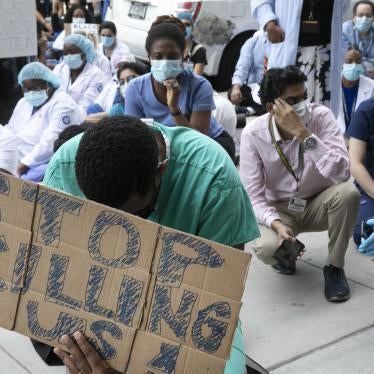 Healthcare workers at Brooklyn's Kings County Hospital show their solidarity with the Black Lives Matter movement during the coronavirus pandemic, New York, June 4, 2020.
