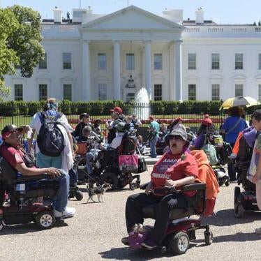 Protesters supporting people with disabilities gather outside the White House in Washington, May 15, 2017