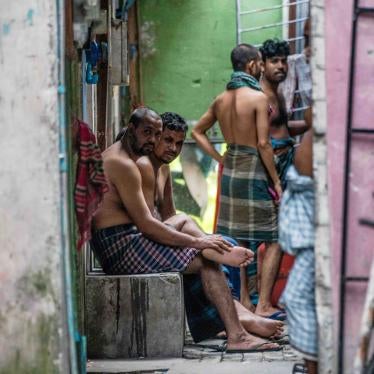 Foreign workers from Bangladesh gather in an alleyway of an accommodation block after being put under quarantine to contain the spread of Covid-19, May 9, 2020 in Male, Maldives. 
