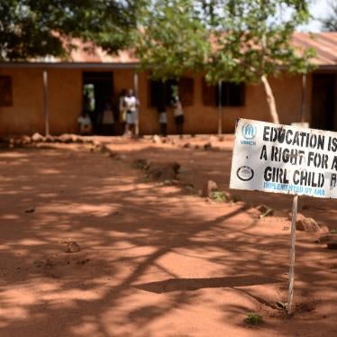 This file photo shows a sign reading "Education is a right for a girl child" at a refugee settlement of people from South Sudan in Imvepi, Uganda, 27 June 2017.