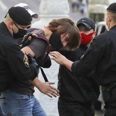 Police officers detain a protester in Minsk, Belarus, on July 14, 2020 during a protest rally against a decision to bar a number of opposition candidates from running in the presidential elections on August 9.