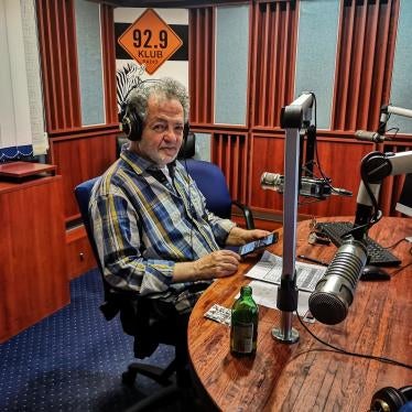 Klubradio’s president, Andras Arato, is seen on air in Klubradio's studio in Budapest, Hungary, March 2020. 