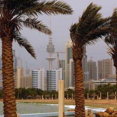 The Kuwait city skyline is seen through the haze of a sand storm in Shuwaikh, Kuwait City.