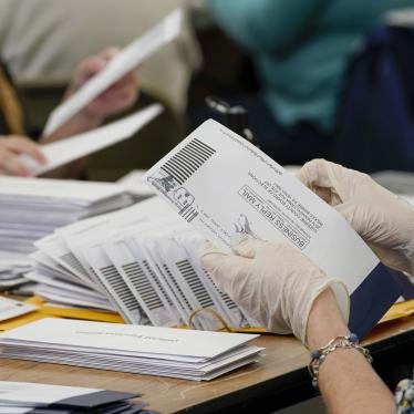 Municipal workers extract Luzerne County ballots from their envelopes, Wednesday, November 4, 2020, in Wilkes-Barre, Pennsylvania. 