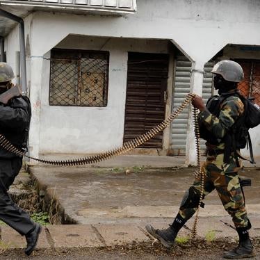 The Rapid Intervention Battalion, an elite unit of the Cameroonian army, patrols the abandoned village of Ekona near Buea in the anglophone South-West region. October 4, 2018.