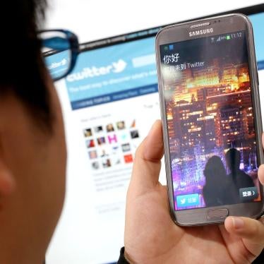 A Chinese smartphone user uses a social networking app in Shanghai