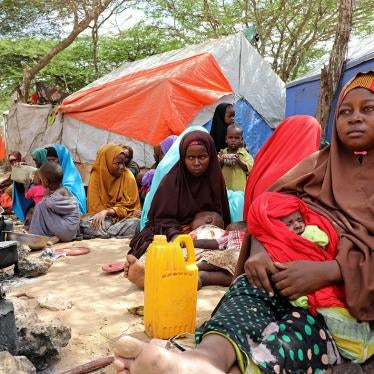 Somali families, displaced after fleeing the Lower Shabelle region amid an uptick in US airstrikes, rest at an internally displaced persons camp near Mogadishu, Somalia, March 12, 2020.
