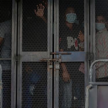 Undocumented migrants are detained during a crackdown by the Immigration Department in response to the Covid-19 pandemic, Petaling Jaya, Malaysia, May 20, 2020.