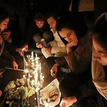 People gather for a candlelight vigil to remember the victims of the Ukraine plane crash, at the gate of Amri Kabir University where some of the victims of the crash were former students, on January 11th, 2020 in Tehran, Iran.