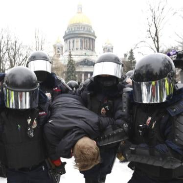 Police officers detain a protester during a rally in support of Alexei Navalny in St. Petersburg, Russia, on January 23, 2021. 