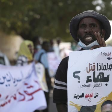 Protesters gather demanding the closure of the headquarters of Rapid Support Forces in Khartoum, Sudan, Thursday, January 14, 2021.