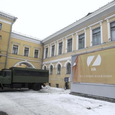 An advertising banner for ZIK TV channel stands in front of the building in which the channel is located, in central Kyiv, Ukraine on 03 February 2021.