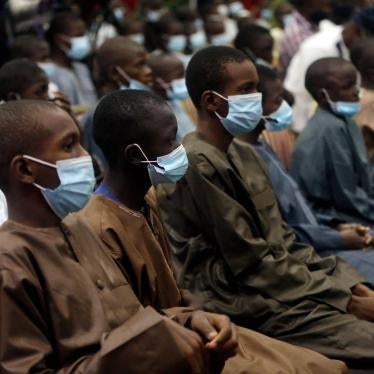 Freed schoolboys look on during a meeting with Nigeria's President Muhammadu Buhari, December 18, 2020, in Katsina, Nigeria, days after an armed group attacked their school and kidnapped them.