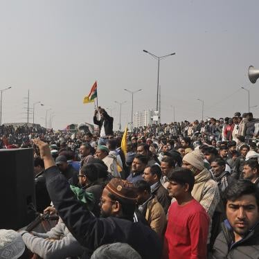 People attend a protest against new farm laws at the Delhi-Uttar Pradesh border, on the outskirts of New Delhi, India, January 29, 2021. 