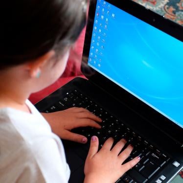 A student uses a laptop for schoolwork while participating in remote learning, September 7, 2020.