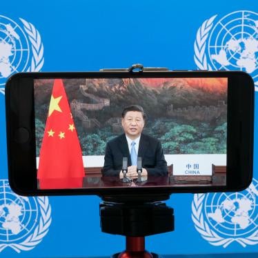 Chinese President Xi Jinping is seen on a phone screen remotely addressing the 75th session of the United Nations General Assembly, September 22, 2020. 