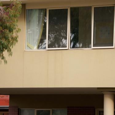 A resident looks out from the window of the Florence Aged Care Facility amid the second wave of the coronavirus disease (COVID-19) in Melbourne, Australia August 17, 2020.