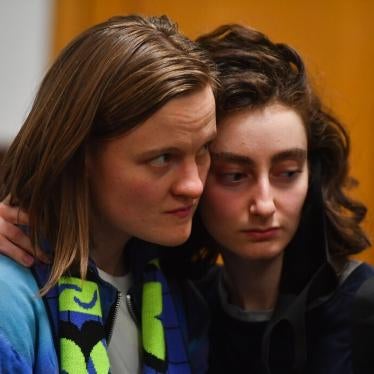 Editors of the student magazine DOXA Natalya Tyshkevich, left, and Alla Gutnikova wait at the Basmanny District Court, in Moscow, Russia. 