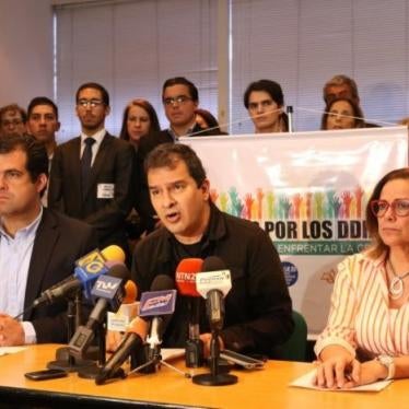 Provea's director speaks at the "United for Human Rights" conference in Caracas, Venezuela. Provea, an NGO, has been targeted by Nicolás Maduro’s government for its role in exposing human rights violations in Venezuela.