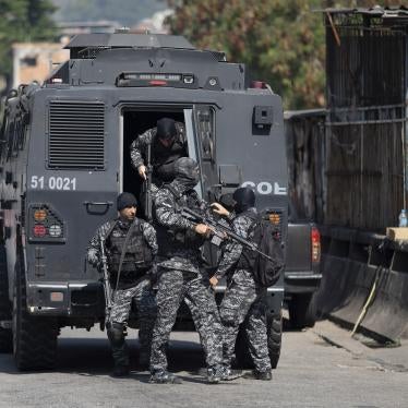 Heavily-armed police get out of an armored vehicle during a May 6, 2021 operation in the Jacarezinho neighborhood of Rio de Janeiro, Brazil. 