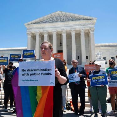 Human Rights Campaign Legal Director Sarah Warbelow speaks at a rally on the steps of the Supreme Court on Thursday, June 17, 2021 in Washington, D.C. following the Fulton decision.