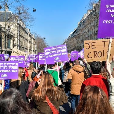 Women demonstrate and march for “First of Chores” on International Day