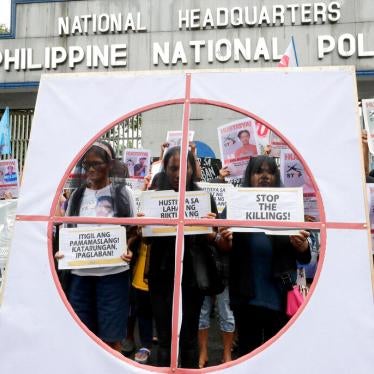 Veiled protesters, mostly relatives of victims of alleged extrajudicial killings by the police