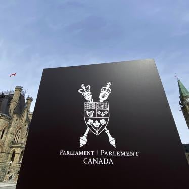The Canadian Parliament buildings are seen in Ottawa, April 27, 2020. © 2020 Adrian Wyld/The Canadian Press via AP