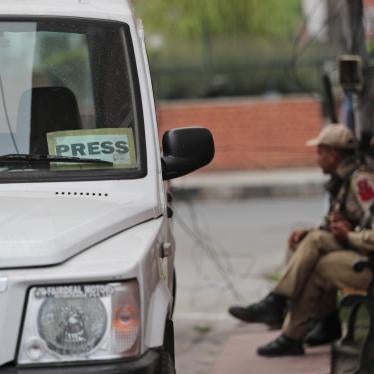 Policemen at the entrance of Press Enclave, which houses several newspaper offices, in Srinagar, India, September 8, 2021. 