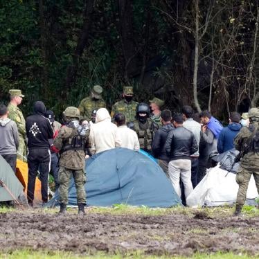 Polish security forces surround migrants at the border with Belarus in Usnarz Gorny, Poland on September 1, 2021. 