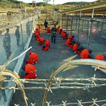 Detainees apprehended after September 11, 2001 in a holding area under surveillance of the US military at Camp X-Ray at the Guantanamo Bay Naval Base, Cuba on January 11, 2002. 