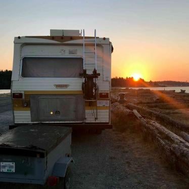 Camper van at sunset