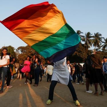 A participant waves a flag during Queer Azadi Pride, an event promoting gay, lesbian, bisexual and transgender rights, in Mumbai, India on February 1, 2020.