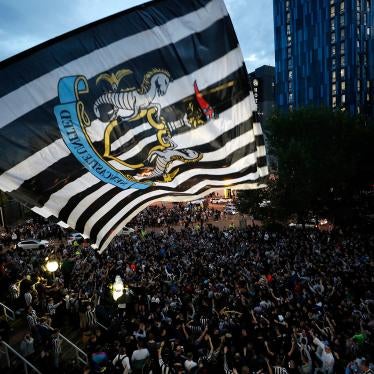 Fans react outside the stadium after the announcement of the Newcastle Takeover in St James' Park, Newcastle, Britain on October 7, 2021. 