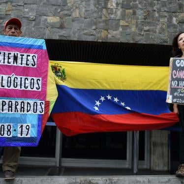 Cancer patients, survivors and their relatives protest against the lack of medicines and medical supplies in hospitals, in front of the headquarters of the Venezuelan Institute of Social Security (IVSS) in Caracas, on August 23, 2019.