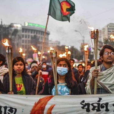 Students and activists take part in a torch procession demanding for the government to take action against murder and rape in Bangladesh. 