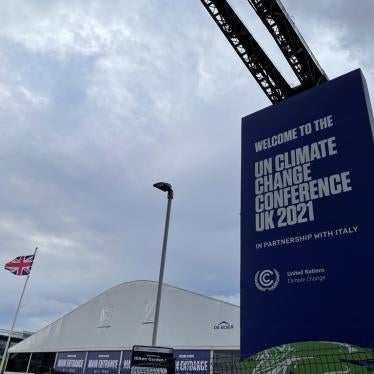Exterior of the COP26 Climate conference, showing the event banner.