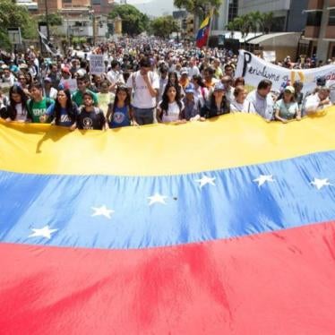 People holding Venezuelan flag