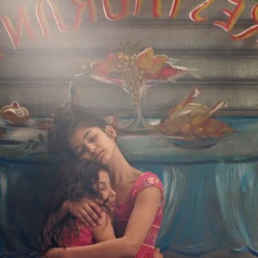 You Resemble Me screengrab of two girls embracing