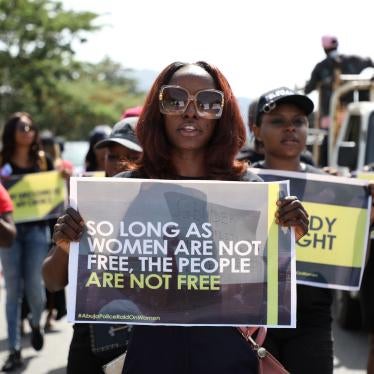 Women march during a protest to challenge impunity and gender-based discrimination raids on women in Abuja, Nigeria, May 10, 2019.