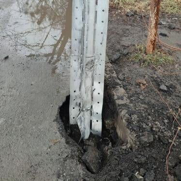 The cargo section of a 9M55K cluster munition rocket that hit a street in Kharkiv